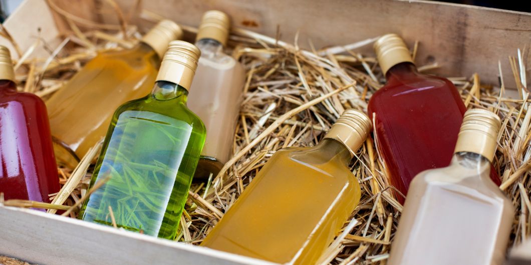 Bottled homemade liqueur resting on a shelf